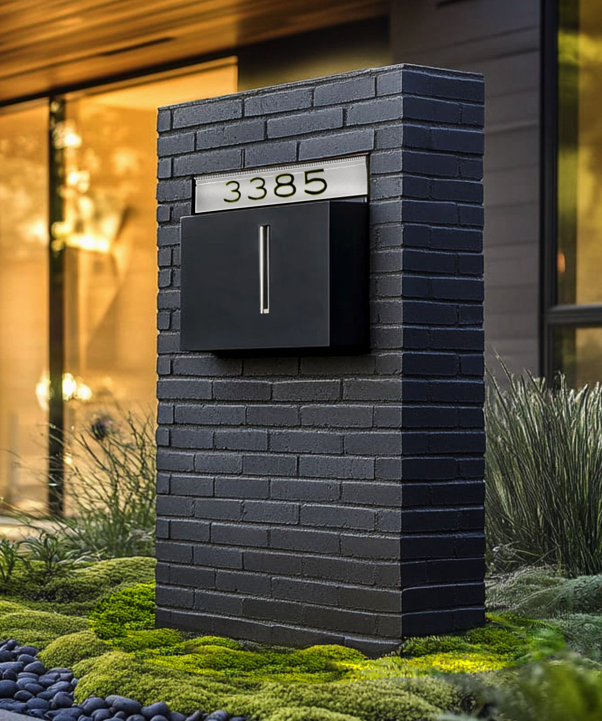 Modern Brick wall with contemporary  black mailbox.