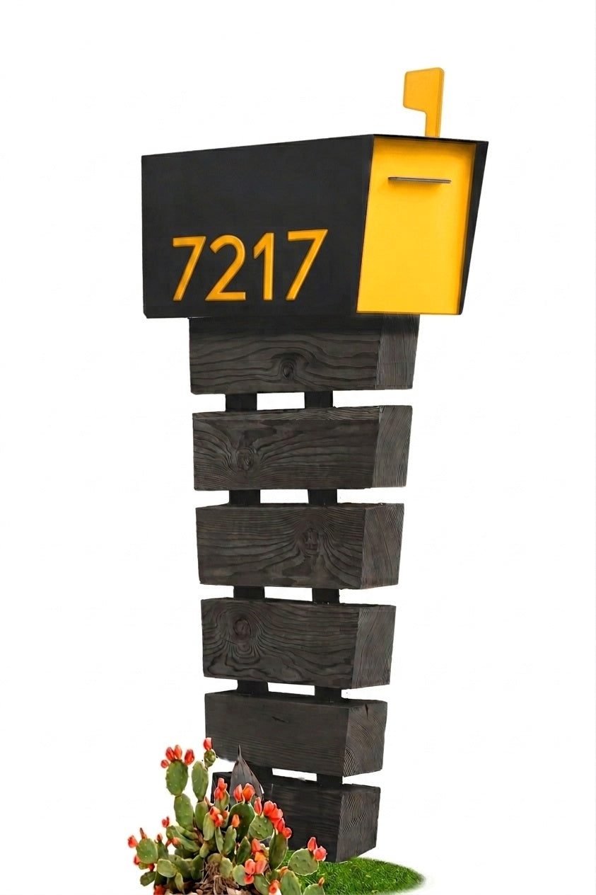 Decorative mailbox with house numbers and a small plant on a white background